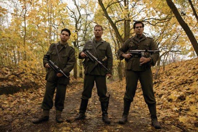 Quentin Tarantino's Nazi-killing fantasy Inglourious Basterds concerns a group of Jewish American soldiers, led by Brad Pitt, getting some ultraviolent payback on the Krauts. Salon's Stephanie Zacharek says, "Tarantino thinks big, and he's got balls. If that were enough to make a masterpiece, Inglourious Basterds would surely be one. But Inglourious Basterds, in addition to having already stirred controversy for its Jews vs. Nazis conceit, is unwieldy, long-winded, self-indulgently nutso and, in places, very, very boring. "It also caps off its two-and-a-half-hour run time with an extended finale â partially orchestrated to David Bowie's 'Cat People' theme song, no less â that I could watch again and again with pleasure. In other words, Tarantino has taken a huge leap and made a movie that doesn't fully work, which presents those of us who love his work, hate his work or love-hate his work â which should cover just about everybody â with a confounding question: Do we praise the leap, or shake our fists at the result?"
